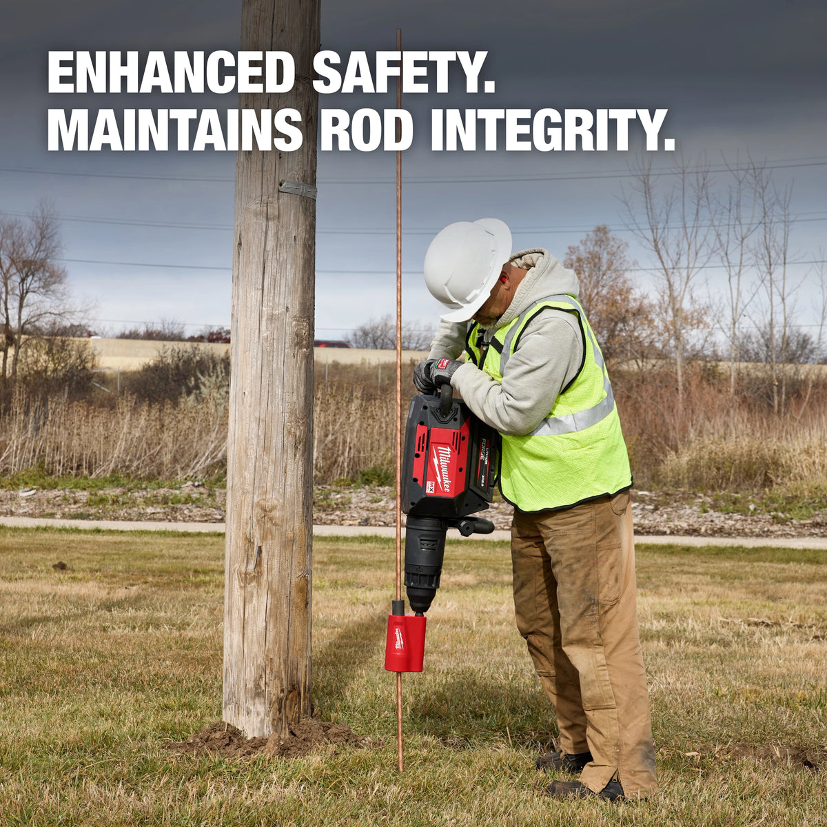 Milwaukee SDS MAX Side Load Ground Rod Driver in use