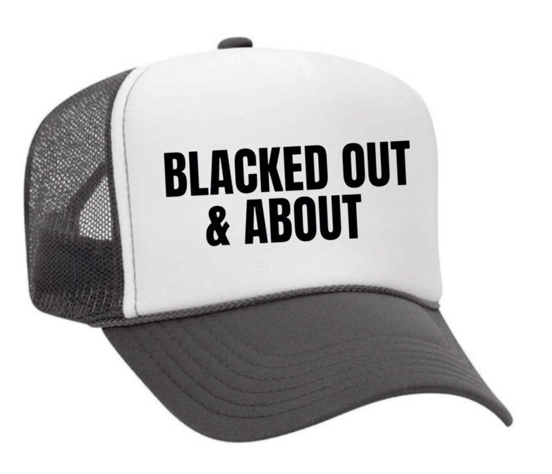 Load image into Gallery viewer, Blacked Out &amp; About Trucker Hat
