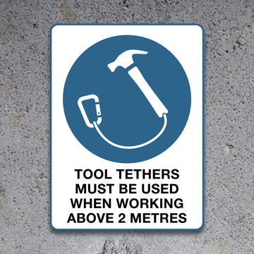 "TOOL TETHERS MUST BE USED" Mandatory Sign